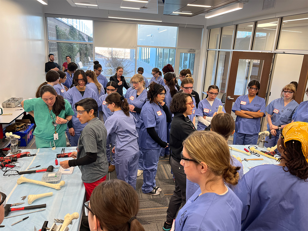 photo: students and mentors at a biomedical engineering event